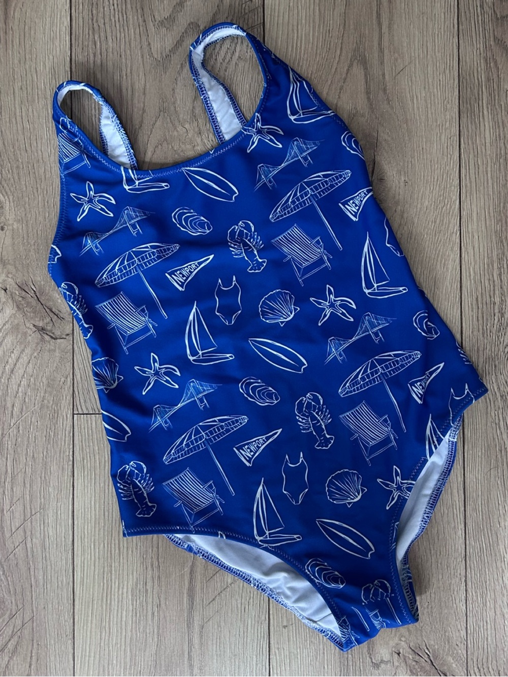 Woman Newport Blue One-Piece Swim Suit with Nautical Print